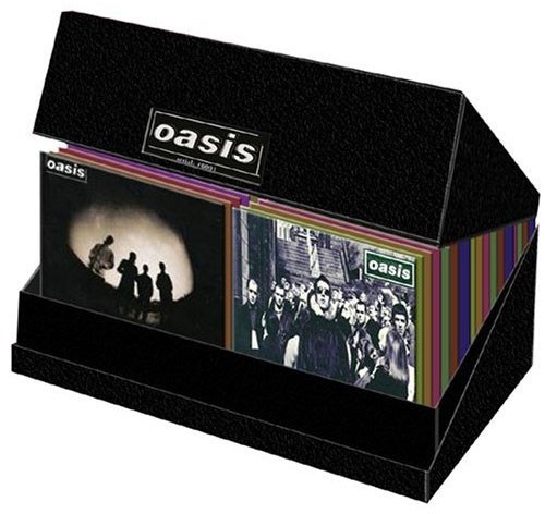 Complete Single Collection ’94–’05 by Oasis single cover art